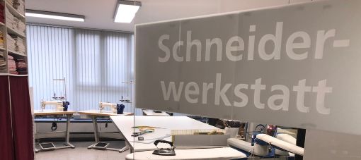 Grapefruit slice atop a pile of other slices