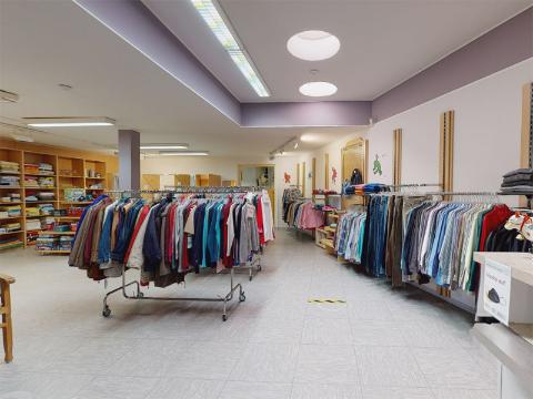 Grapefruit slice atop a pile of other slices